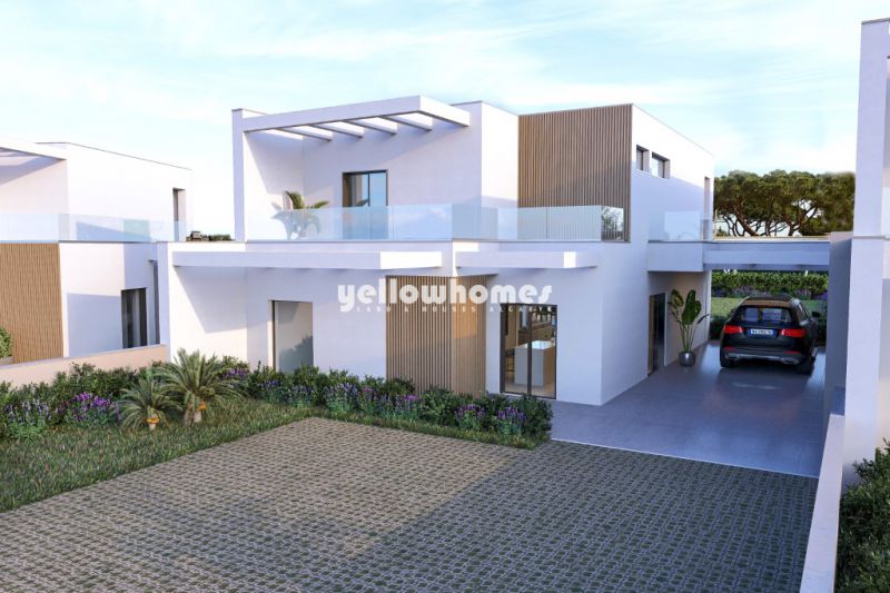 Moradias modernas V4 com jardim privado e piscina perto de Vilamoura/Vila Sol